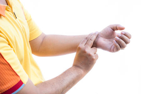 Checking puls isolated on white bacgroundの写真素材