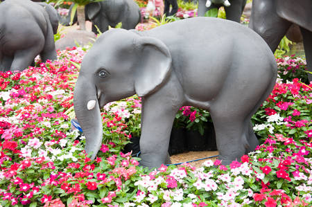 Elephant statues in a gardenの写真素材