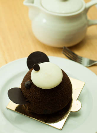 Chocolate cake on wooden table close-upの写真素材
