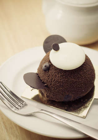 Chocolate cake on wooden table close-upの写真素材