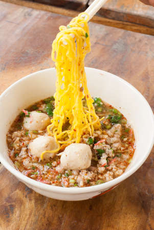 noodles and pork and meat ballsの写真素材