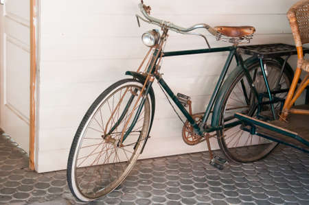 Old bicycle on the streetの写真素材