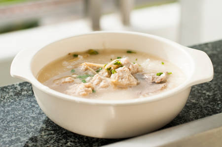 Asian style breakfast soft boiled riceの写真素材