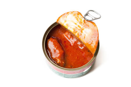 Opened can with tinned fish in tomato sauceの写真素材