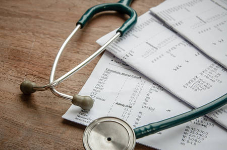 stethoscope and laboratory result, Medical insurance concept.の写真素材