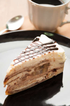 banana crape cake with coffeeの写真素材