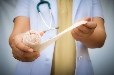 Doctor imposes bandageの写真素材