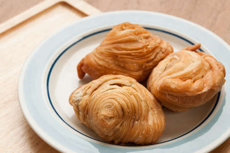 Curry Puffs (Epok-Epok / Karipap Pusing) - Deep Fried Malaysian, Singaporean, and Thai snack filled with curried meat and/or vegetables.の写真素材