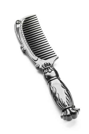 Black comb isolated on white background, vintage