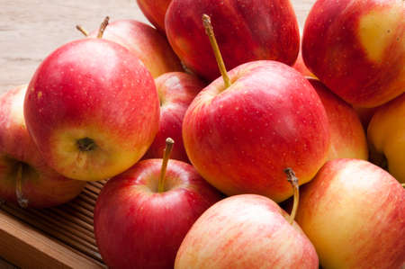 Red apples in wooden boxの写真素材