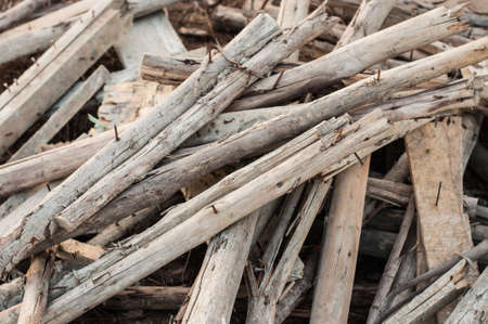 Wooden planks of a demolished house.の写真素材