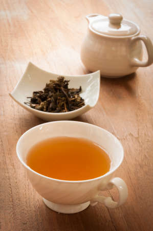 tea cup full of teaの写真素材