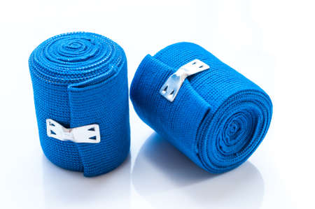 roll of elastic wrap bandage on white backgroundの写真素材