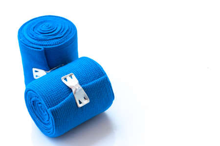 Medical blue elastic Bandage isolated on white backgroundの写真素材