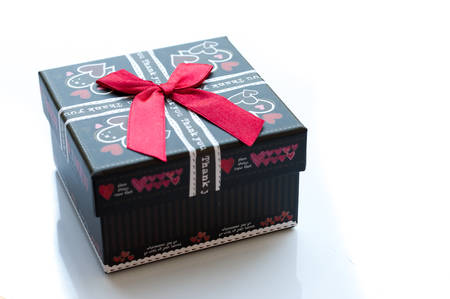 black box wrapping ribbon bow isolated on white