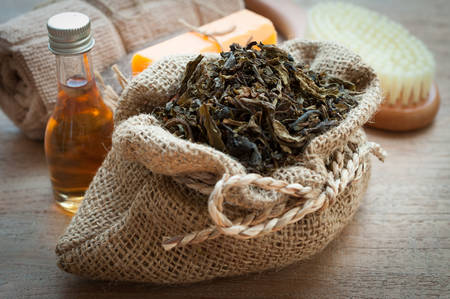 green tea, a towel on the bamboo mat, spa conceptの写真素材
