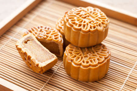 Mid-Autumn Festival moon cake on wooden boardの写真素材
