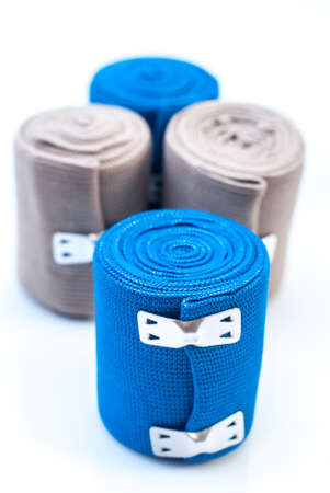 medical elastic tensor bandage with reflection on white backgroundの写真素材