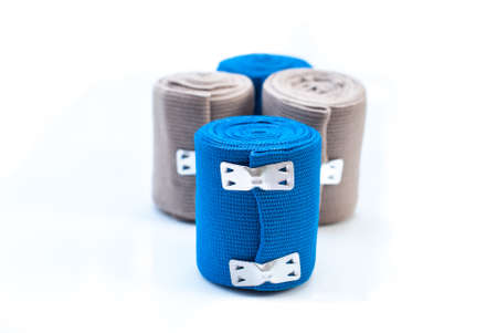 medical elastic tensor bandage with reflection on white backgroundの写真素材