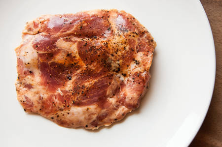 Organic Red Raw Steak Sirloin against a backgroundの写真素材