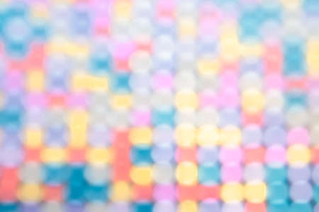 Multicolored defocused bokeh lights background with space for textの写真素材