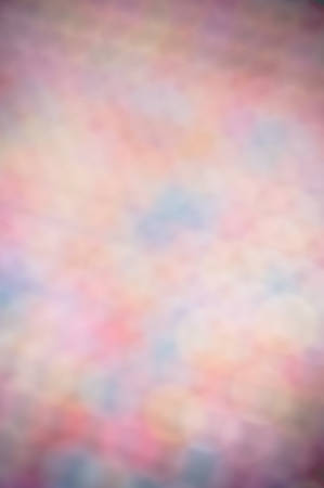 Multicolored defocused bokeh lights background with space for textの写真素材