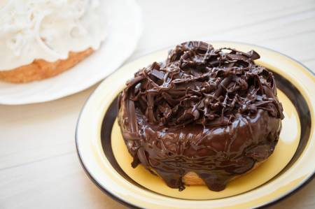 Half-donut and half-croissant pastries, chocolate, white chocolate, Traditional French puff...