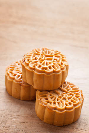 Mid-Autumn Festival moon cake on wooden boardの写真素材