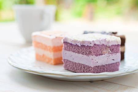 Different pieces of cake. Isolated on white の写真素材