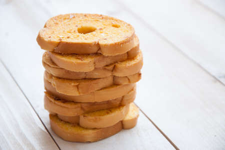 Garlic Bread on white wooden boardの写真素材