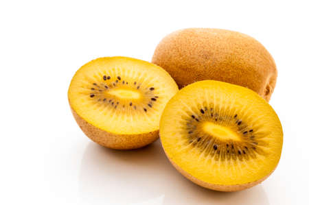 Yellow kiwi fruit on a white の写真素材
