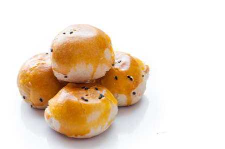 Chinese pastry moon cake with cup of teaの写真素材