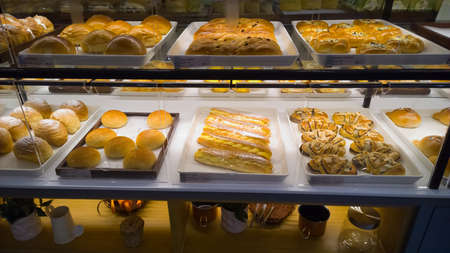 Variety of baked products at a bakeryの写真素材