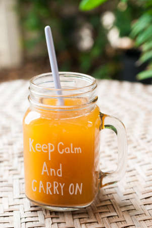 ice tea in mason jar with cake, thai teaの写真素材