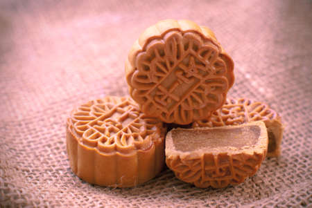 Mid-Autumn Festival moon cake on burlap backgroundの写真素材