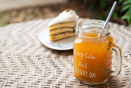 ice tea in mason jar with cake, thai tea