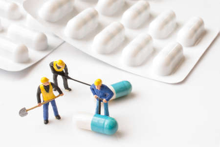 miniature people on the drugs or pils, medical conceptの写真素材
