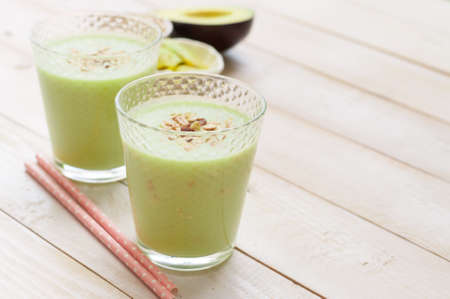 fresh avocado smoothie on gray backgroundの写真素材