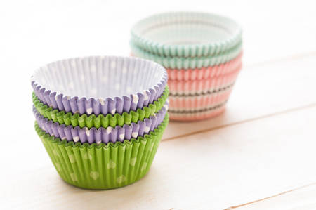 Brightly colored paper baking cups for cupcakes or muffinsの写真素材