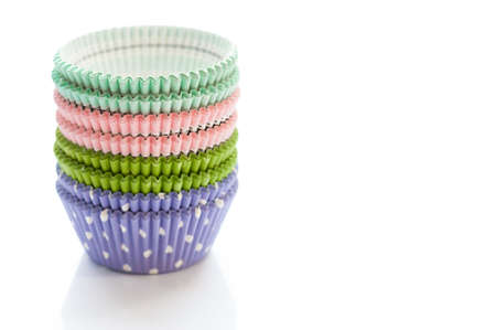 Brightly colored paper baking cups for cupcakes or muffinsの写真素材