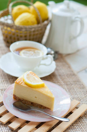 A slice of lemon cheesecake.の写真素材