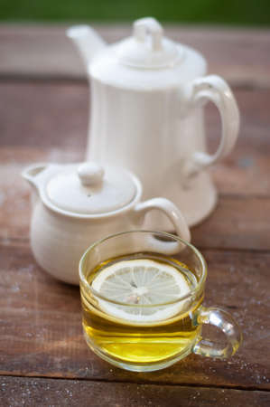 lemon tea on grunge wooden backgroundの写真素材