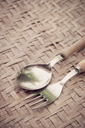 spoon and fork on tableの写真素材