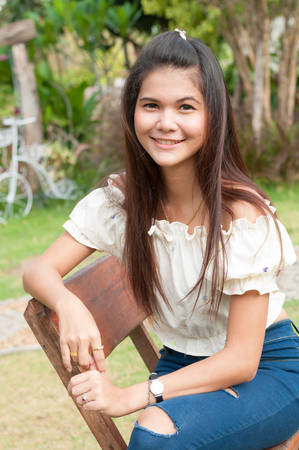 A shot of a beautiful asian woman outdoorの写真素材