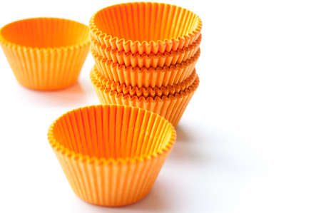 empty cupcake paper liners, cases isolated on whiteの写真素材
