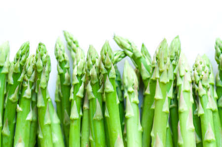 Fresh green asparagus on whiteの写真素材