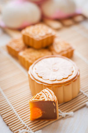 Mid-Autumn Festival moon cake on wooden boardの写真素材