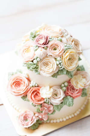 cakes decorated with flowers view from the topの写真素材