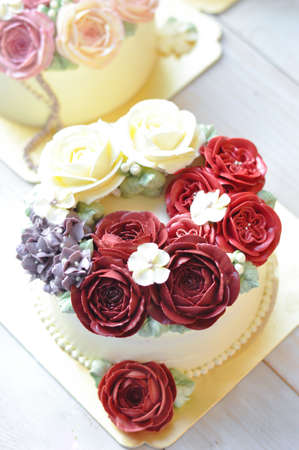 cakes decorated with flowers view from the topの写真素材