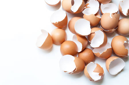 Eggs Cracked isolated on white backgroundの写真素材